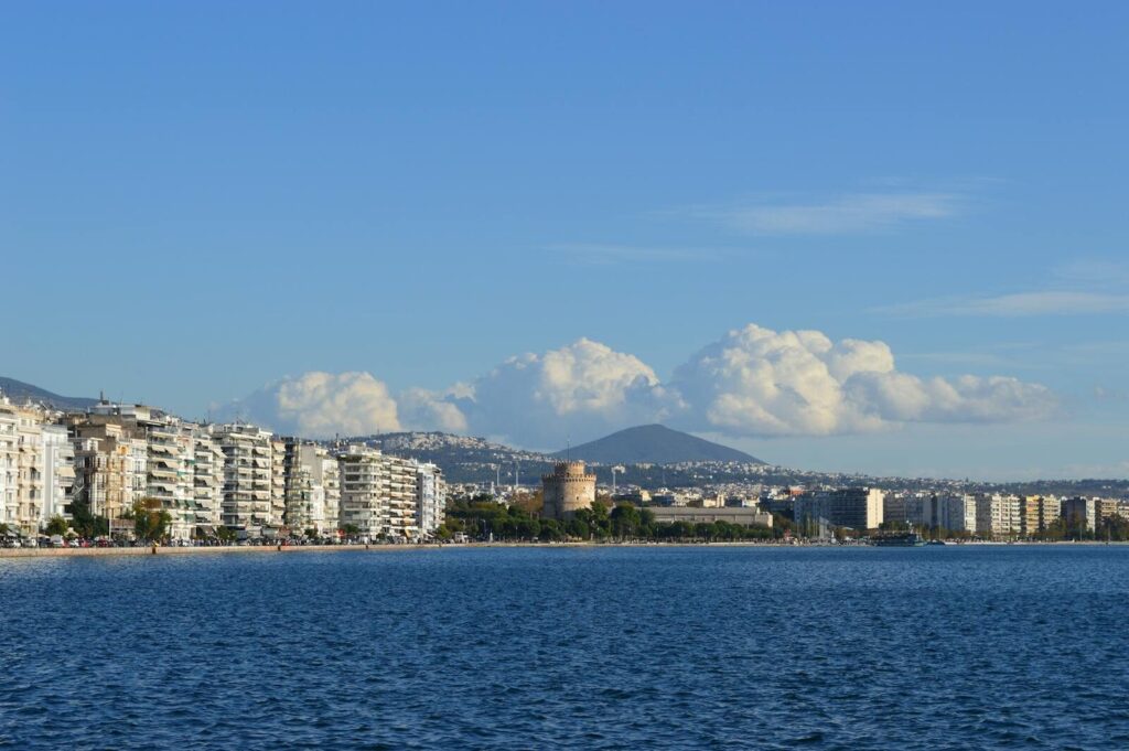 Beautiful seaside view of Thessaloniki, Greece featuring the iconic White Tower and city skyline.